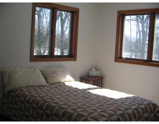 1 Taylor Road Maynard, MA 01754 - Photo 13 of 18 a bedroom with a bed and window