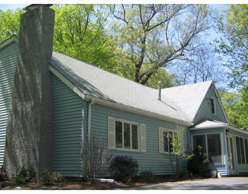 1 Taylor Road Maynard, MA 01754 - Photo 3 of 18 a view of a white house next to a yard