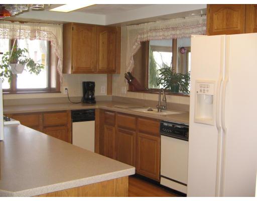 1 Taylor Road Maynard, MA 01754 - Photo 4 of 18 a kitchen with stainless steel appliances granite countertop a sink and a white cabinets