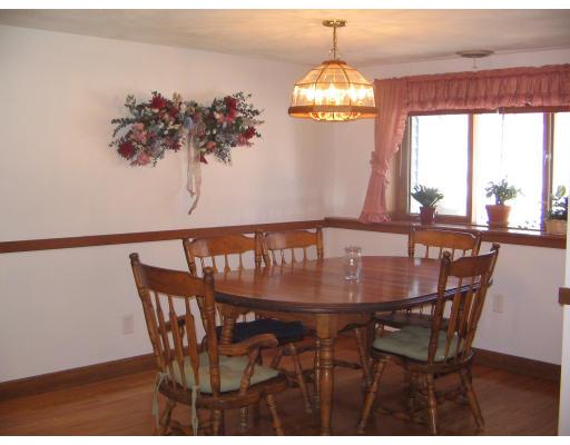 1 Taylor Road Maynard, MA 01754 - Photo 5 of 18 a view of a dining room with furniture window and outside view