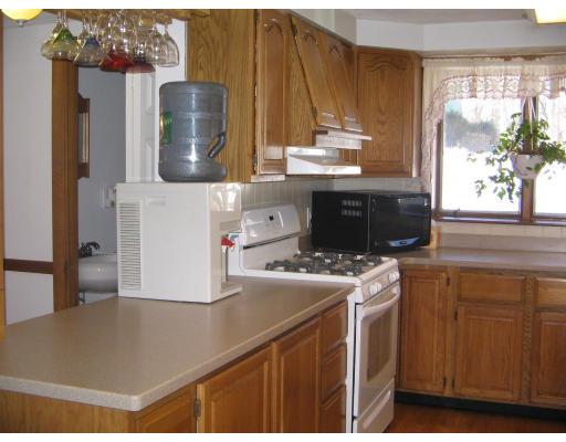 1 Taylor Road Maynard, MA 01754 - Photo 10 of 18 a kitchen with kitchen island a sink stove and refrigerator