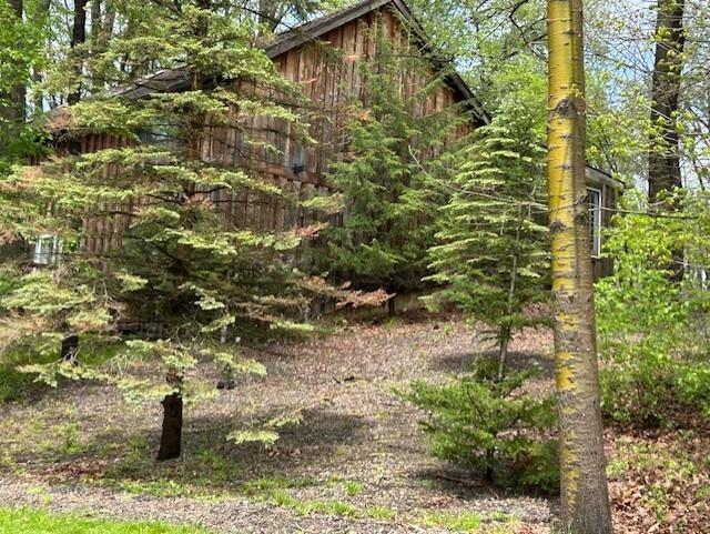 402 Tomahawk Trail Mercer, PA 16137 - Photo 3 of 26 a view of a garden with a bench
