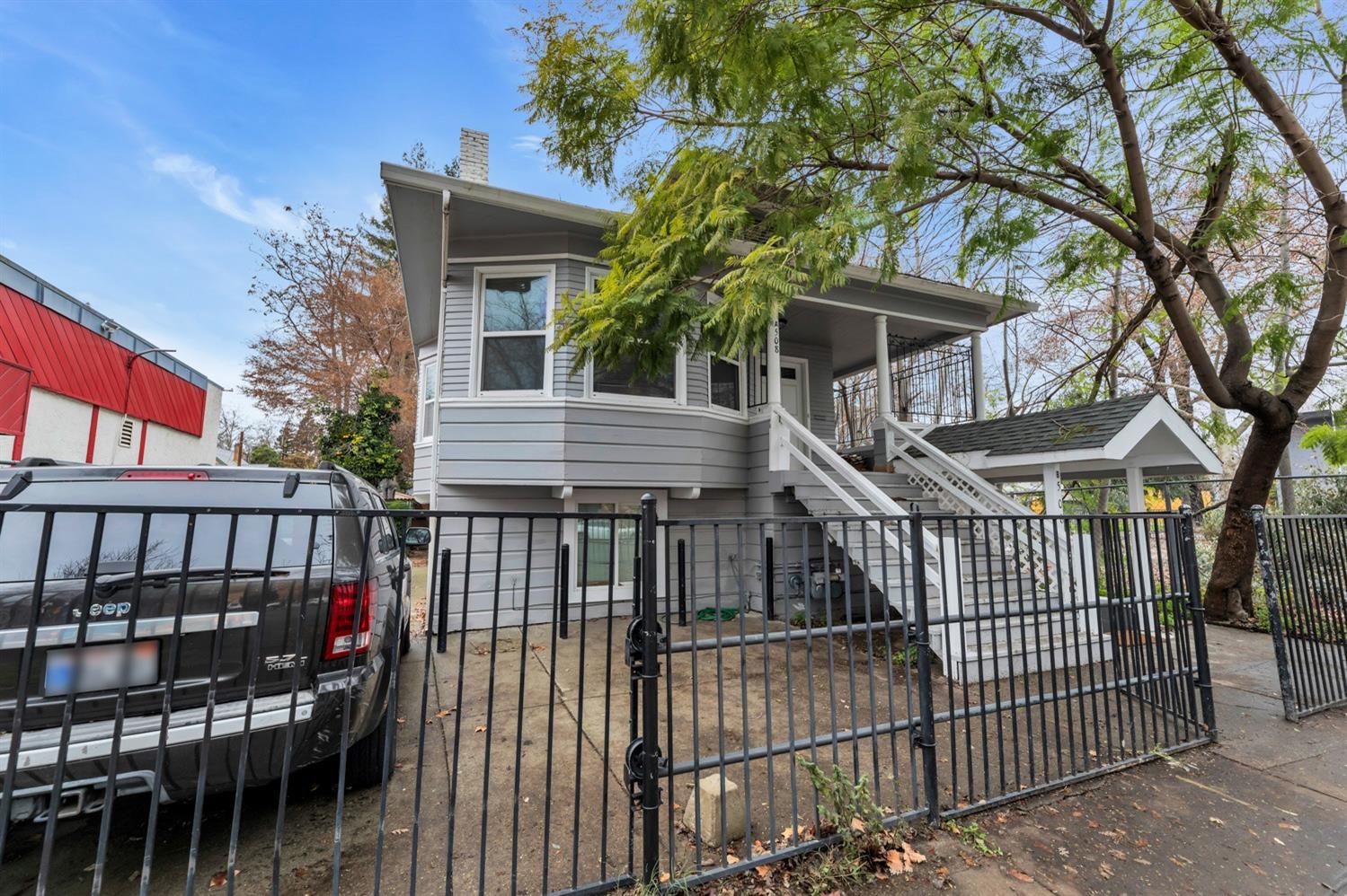 508 16th Street Sacramento, CA 95814 - Photo 1 of 69 a view of a house with a wooden deck and a large tree