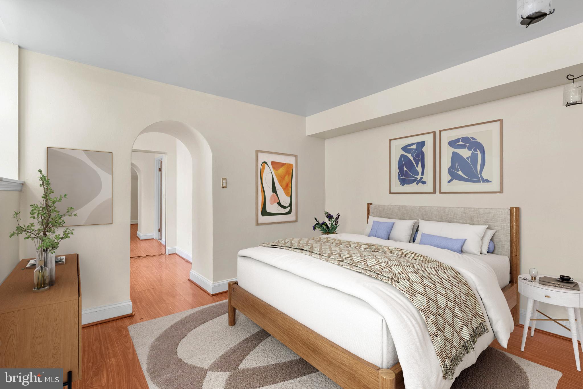 2024 Spring Garden Street, Unit 4 Philadelphia, PA 19130 - Photo 20 of 28 a spacious bedroom with a bed and a couch