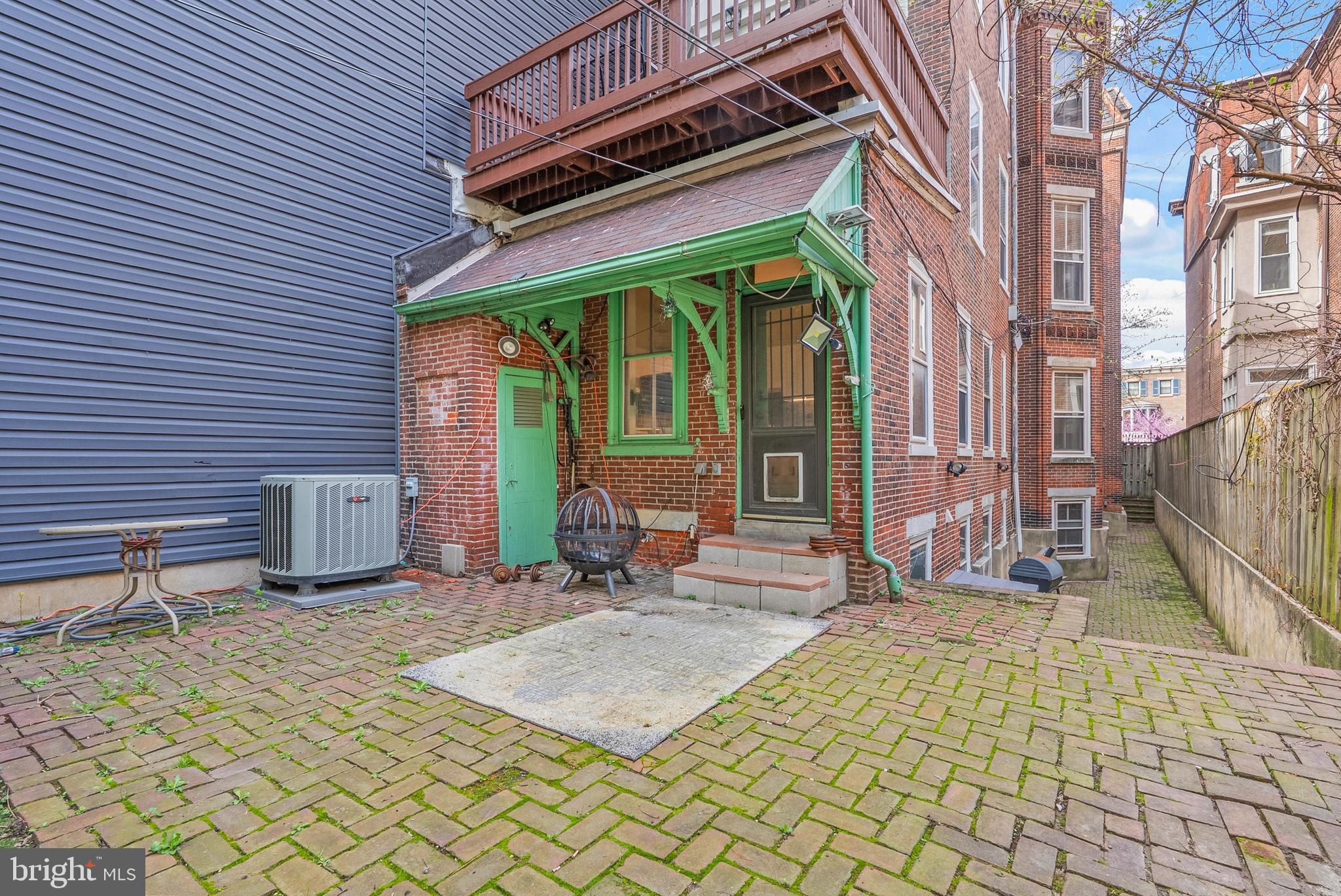 2024 Spring Garden Street, Unit 4 Philadelphia, PA 19130 - Photo 26 of 28 a backyard of a house with seating space