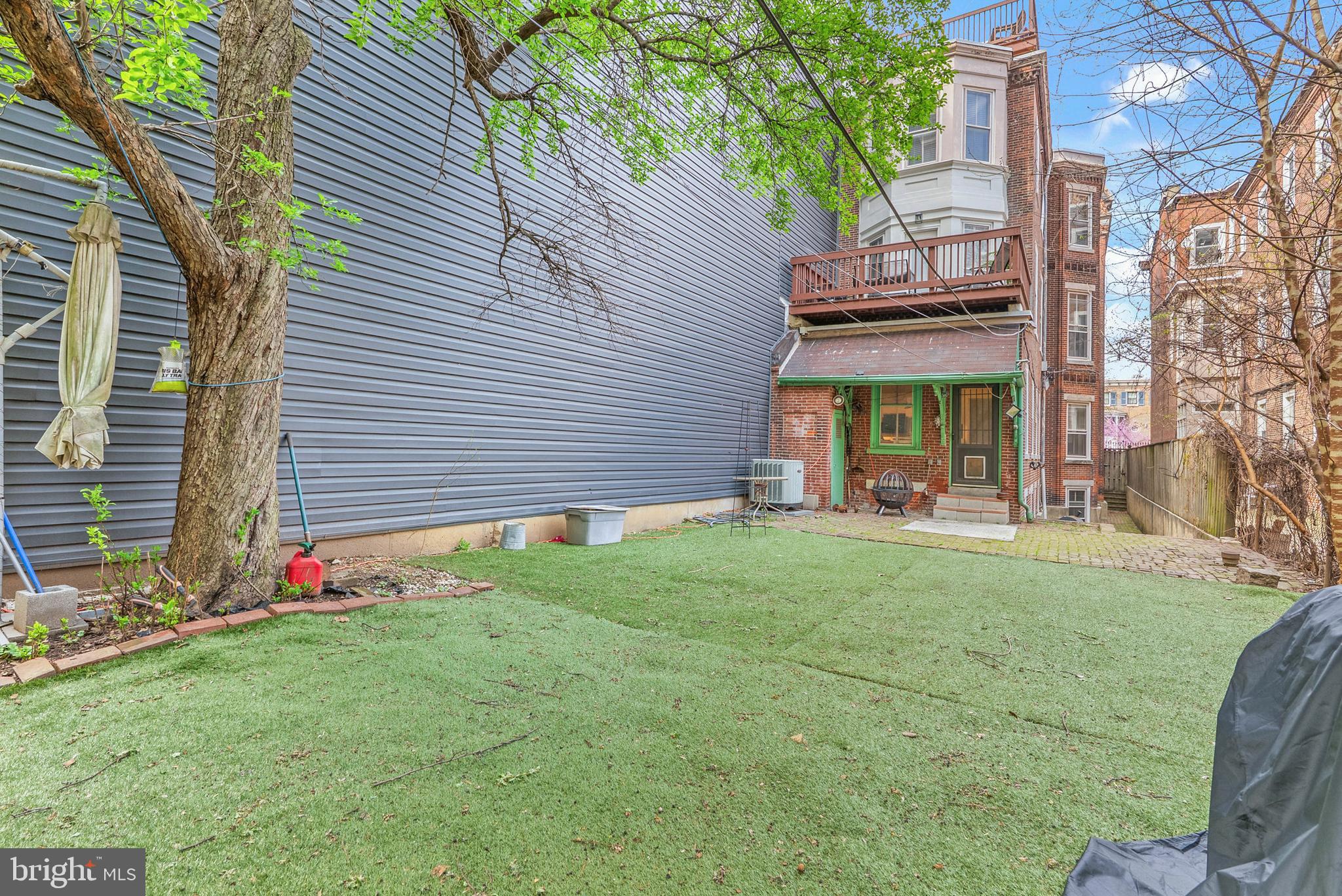 2024 Spring Garden Street, Unit 4 Philadelphia, PA 19130 - Photo 27 of 28 a front view of a house with a yard