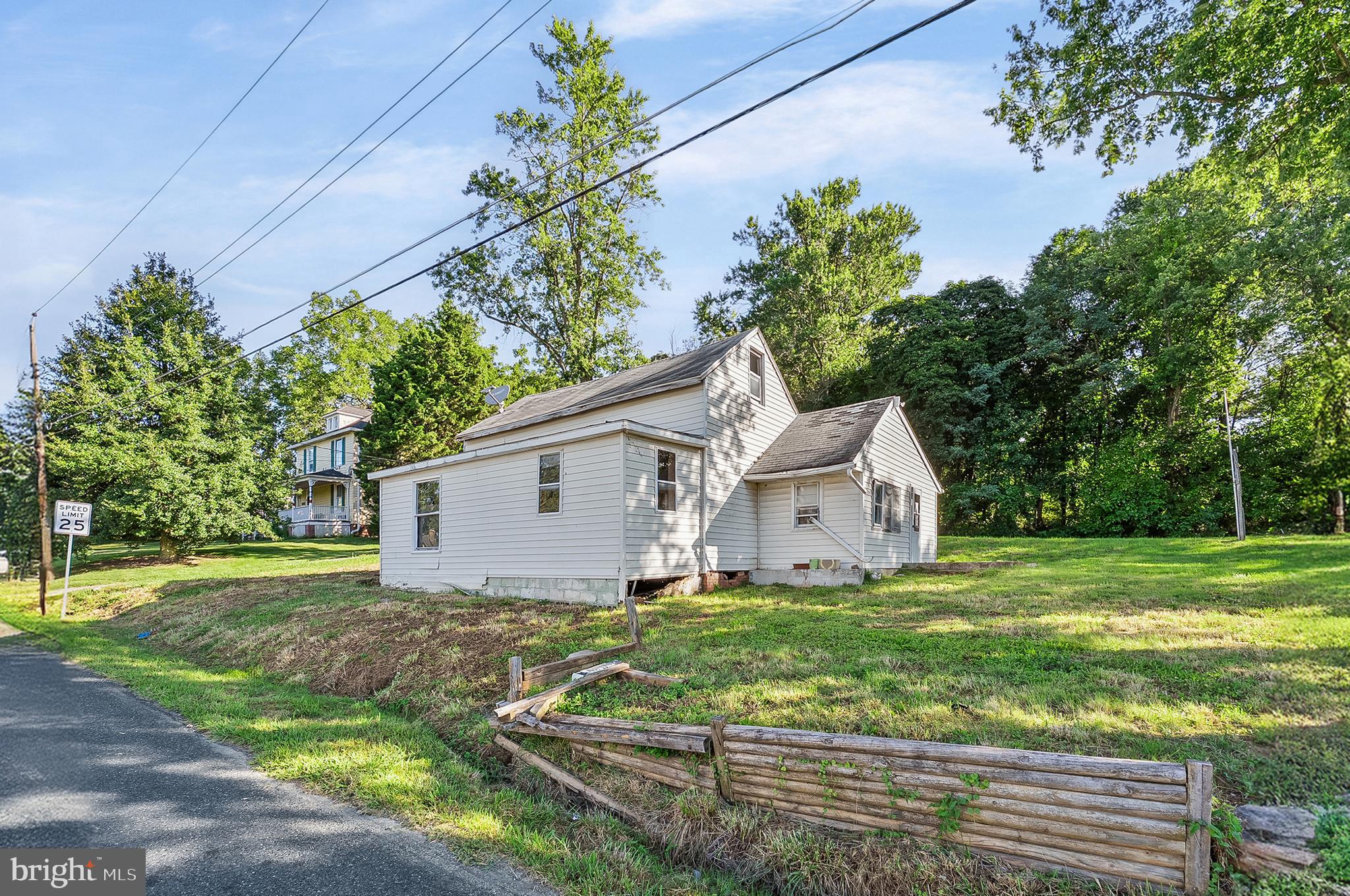 a house with garden in front of it