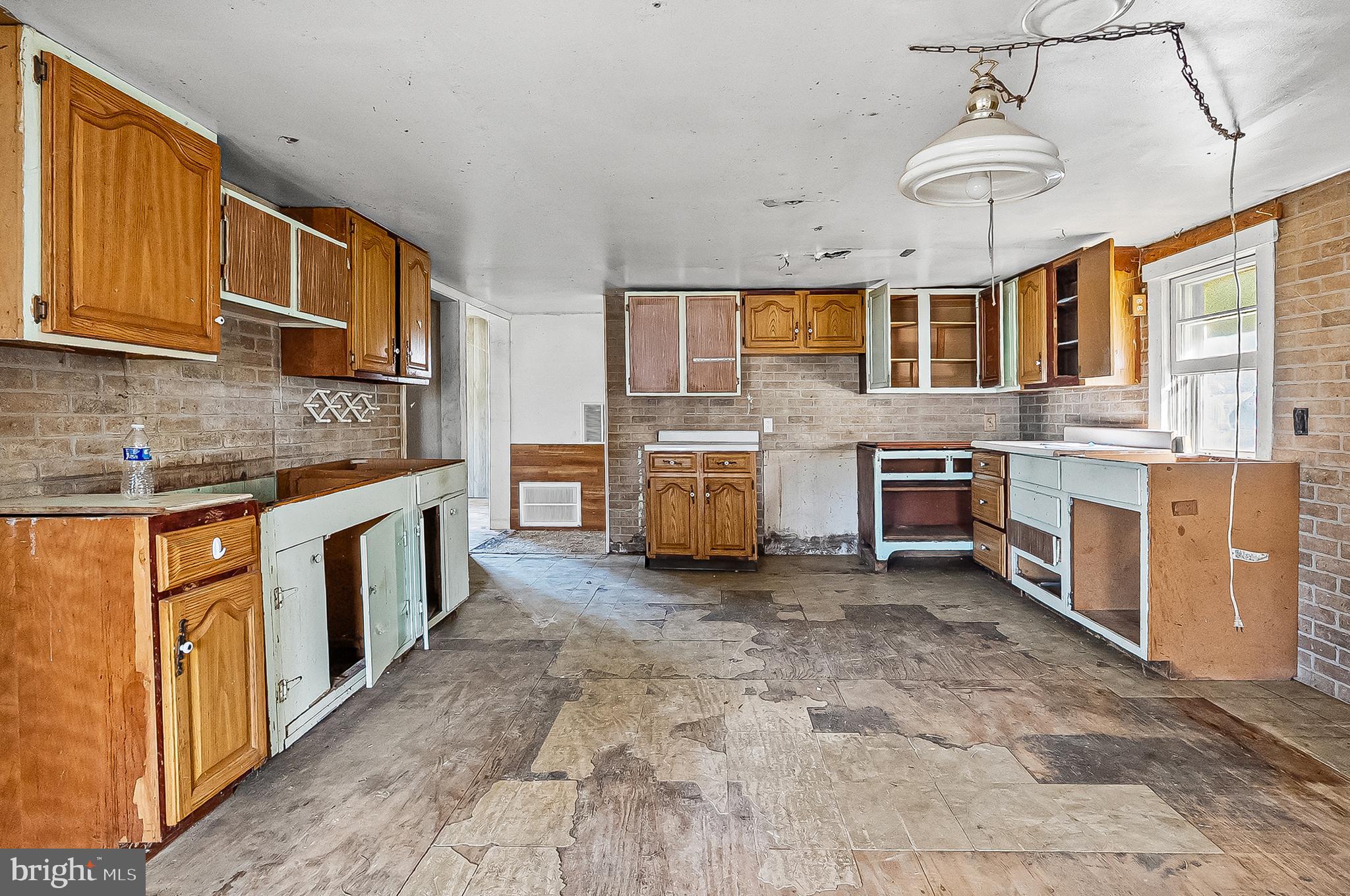 1211 Van Bibber Road Edgewood, MD 21040 - Photo 4 of 25 a kitchen with stainless steel appliances granite countertop a stove a sink and a refrigerator