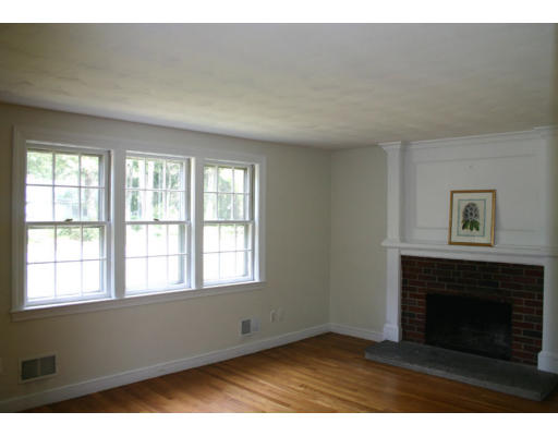193 Oxbow Road Wayland, MA 01778 - Photo 13 of 20 a view of an empty room with a window and fireplace