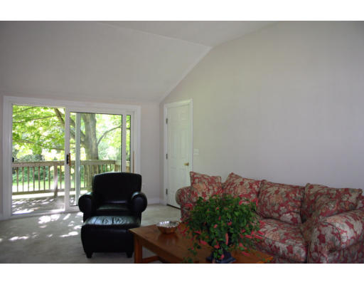193 Oxbow Road Wayland, MA 01778 - Photo 9 of 20 a living room with furniture and a large window