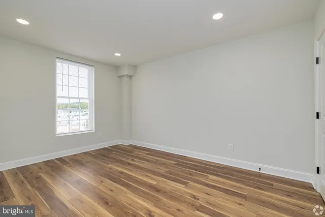 an empty room with window