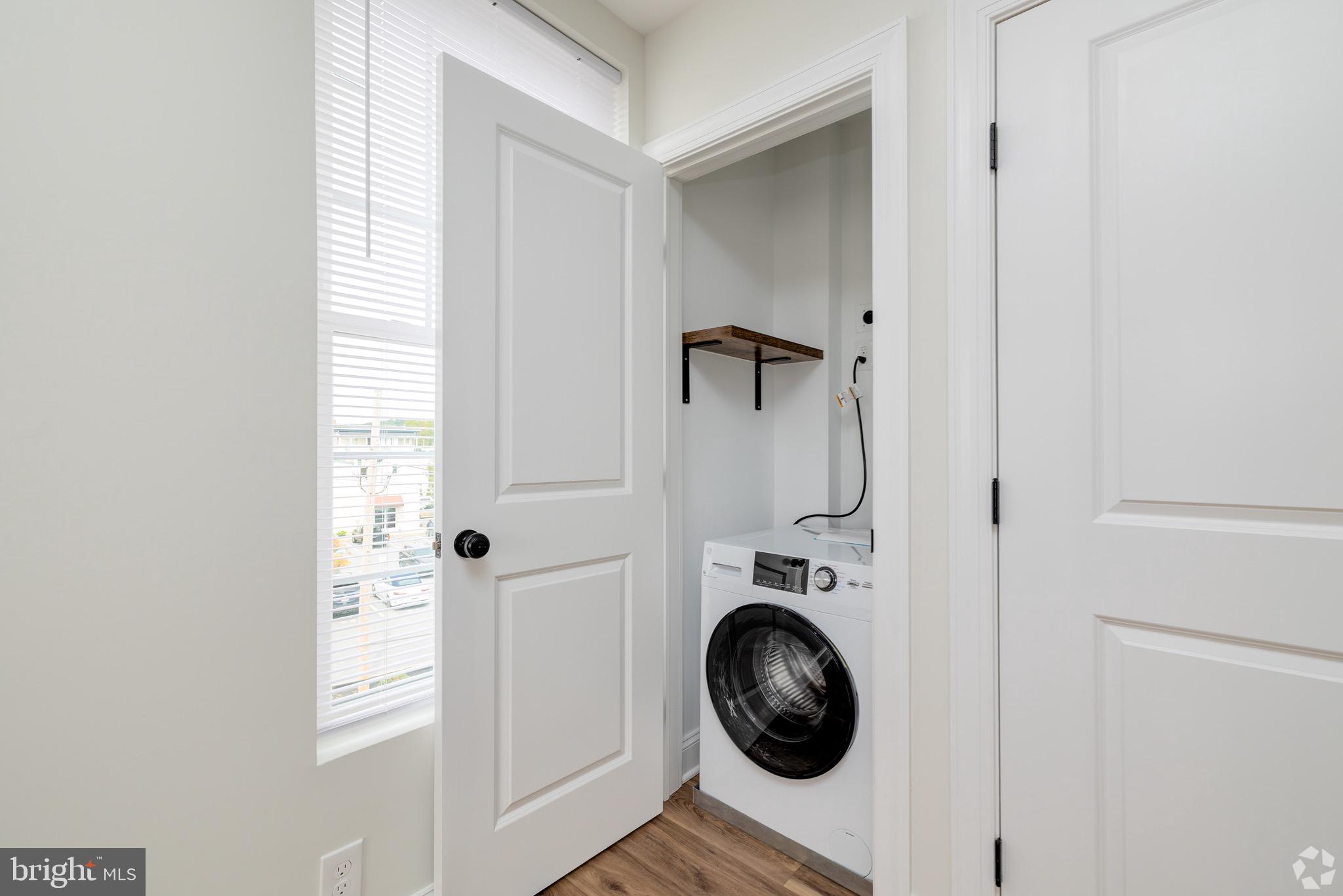 112 Washington Avenue, Unit 9 Downingtown, PA 19335 - Photo 6 of 8 a view of bathroom with washer and dryer