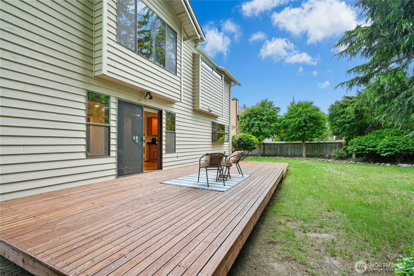 5211 103rd Street Southwest, Unit SW Mukilteo, WA 98275 - Photo 31 of 40 a view of house with backyard and deck