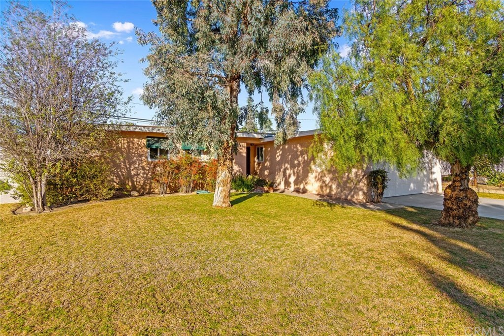 5847 East Rogene Street Long Beach, CA 90815 - Photo 1 of 1 Breezy established trees on large front yard.