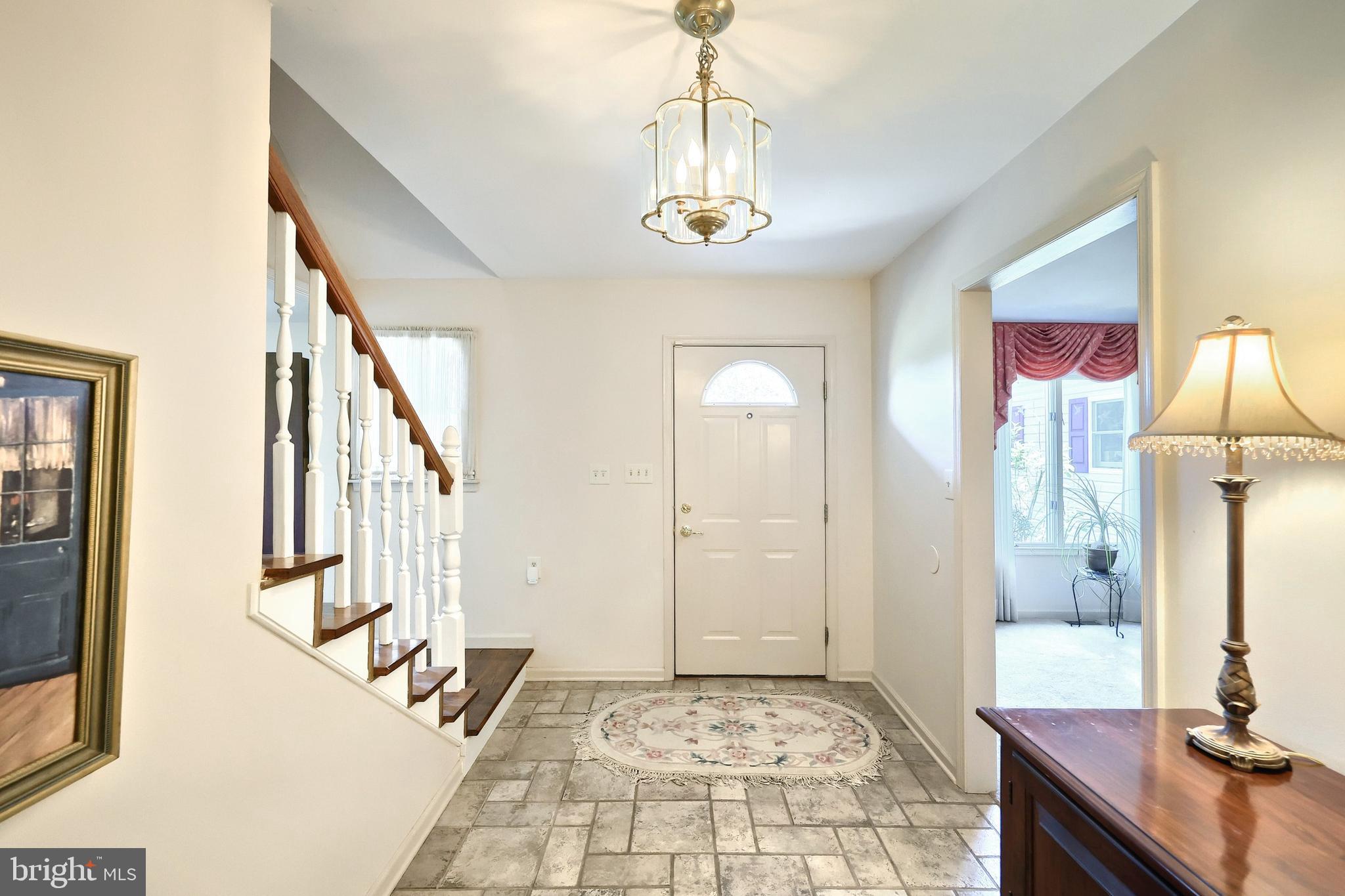 355 Sachs Road Gettysburg, PA 17325 - Photo 5 of 49 a view of an entryway with wooden floor and a livingroom
