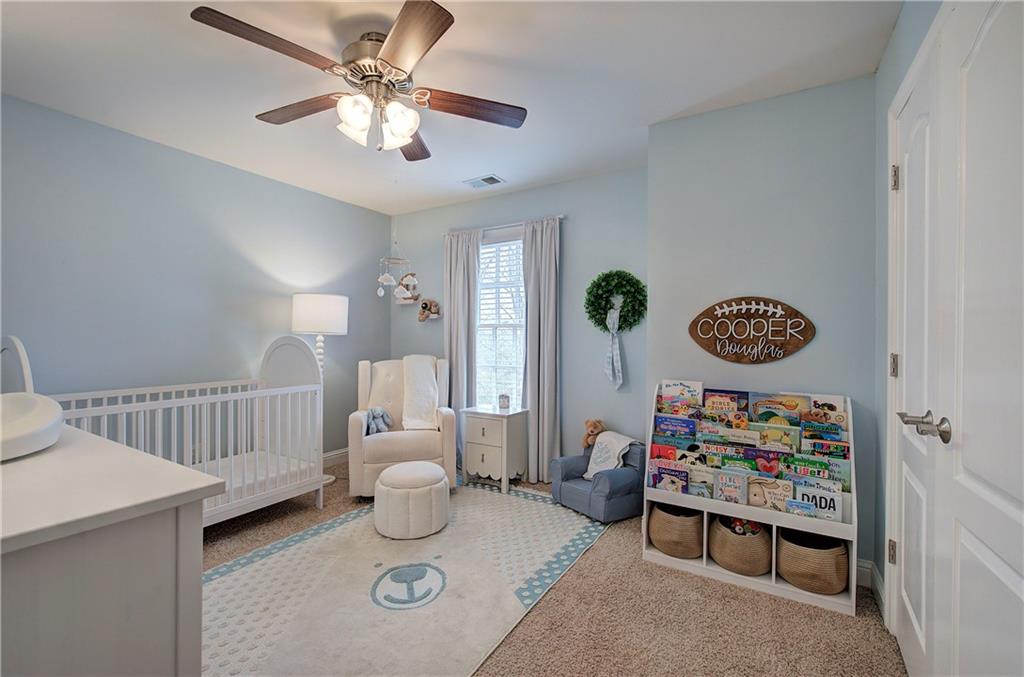 16 Thunderhawk Lane Rydal, GA 30171 - Photo 21 of 37 a bedroom with furniture and a window