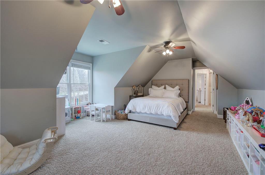 16 Thunderhawk Lane Rydal, GA 30171 - Photo 27 of 37 a bedroom with a bed and window