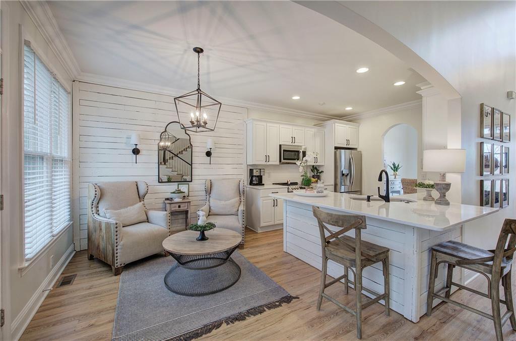 16 Thunderhawk Lane Rydal, GA 30171 - Photo 6 of 37 a living room with kitchen island furniture and a wooden floor