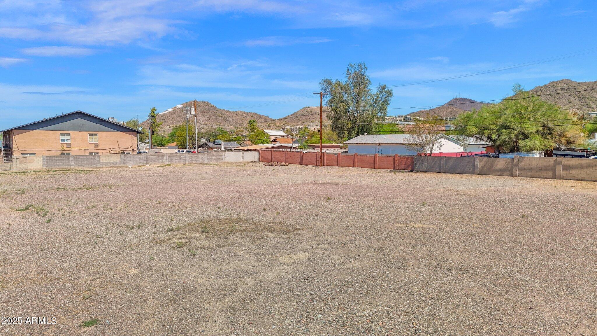 330 East Hatcher Road, Unit 6 Phoenix, AZ 85020 - Photo 9 of 9 a view of a road with a building in the background