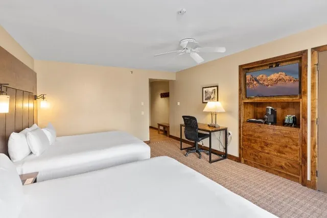 a bedroom with a bed and furniture