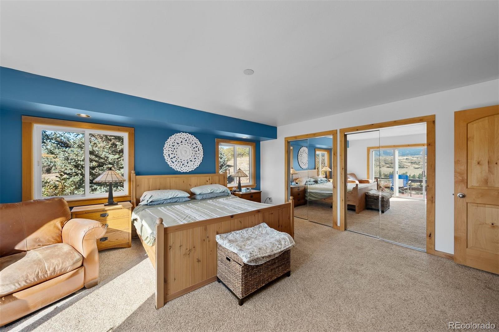 4466 West Parkridge Road Sedalia, CO 80135 - Photo 10 of 23 a living room with furniture and a table