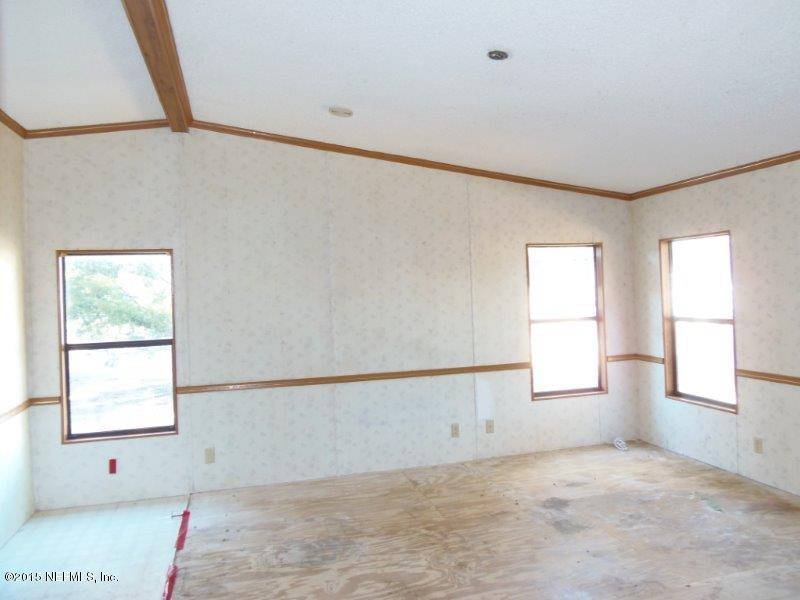 4135 Old Jennings Road Middleburg, FL 32068 - Photo 11 of 13 a view of an empty room with a window