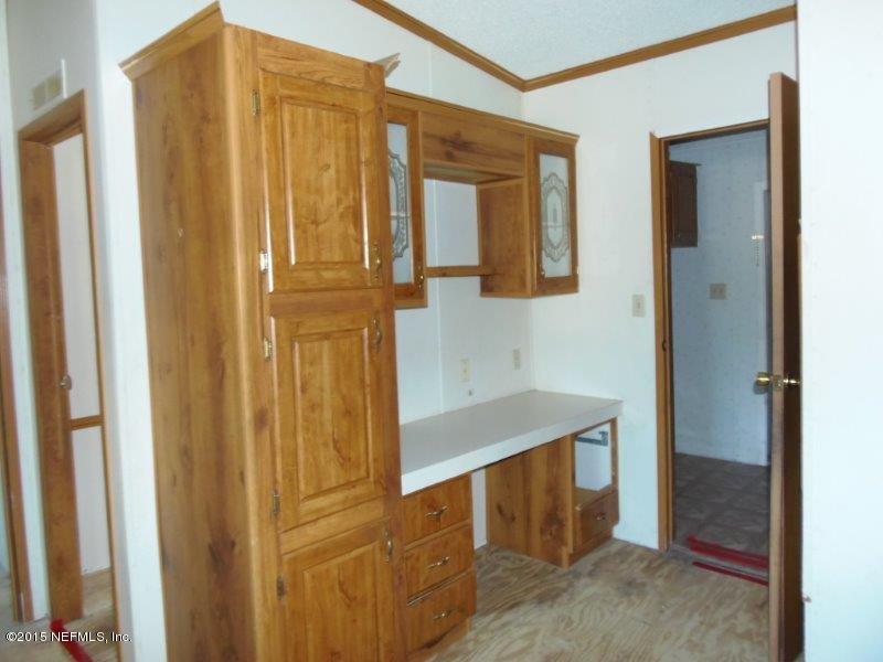 4135 Old Jennings Road Middleburg, FL 32068 - Photo 7 of 13 a bathroom with a bathtub and a sink