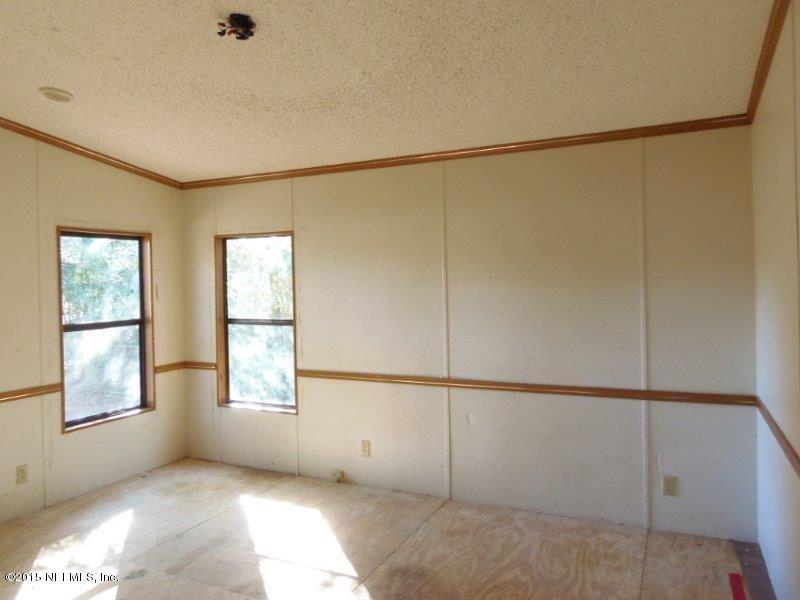 4135 Old Jennings Road Middleburg, FL 32068 - Photo 8 of 13 a view of an empty room with a window