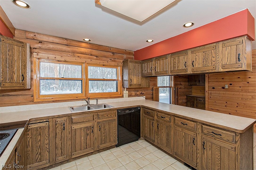 11575 Colburn Road Painesville, OH 44077 - Photo 20 of 23 The kitchen has tons of cabinet and counter space.