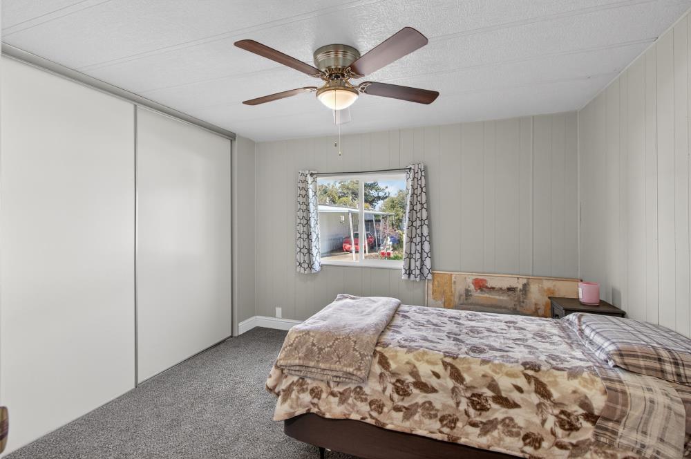 7460 Azimuth Lane, Unit 253 Sacramento, CA 95842 - Photo 12 of 50 a bedroom with a bed and window