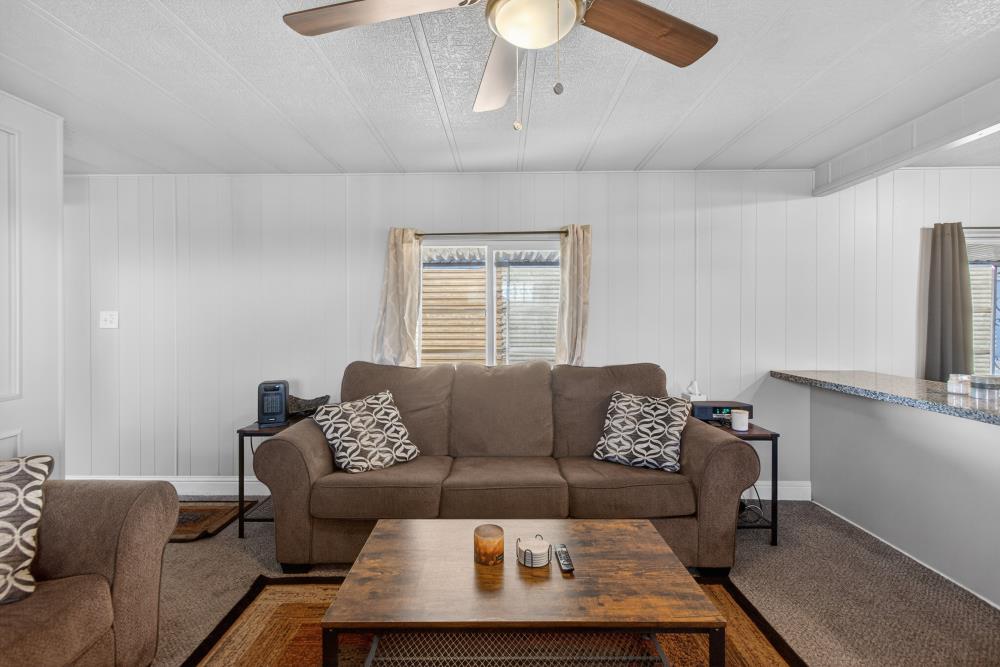 7460 Azimuth Lane, Unit 253 Sacramento, CA 95842 - Photo 21 of 50 a living room with furniture and a window