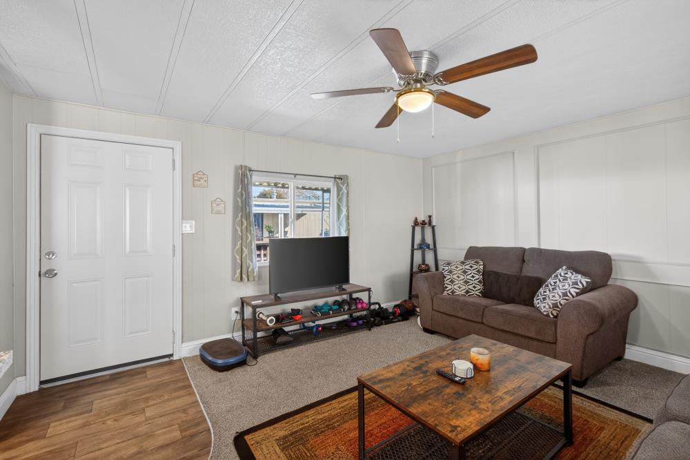 7460 Azimuth Lane, Unit 253 Sacramento, CA 95842 - Photo 22 of 50 a living room with furniture and a window