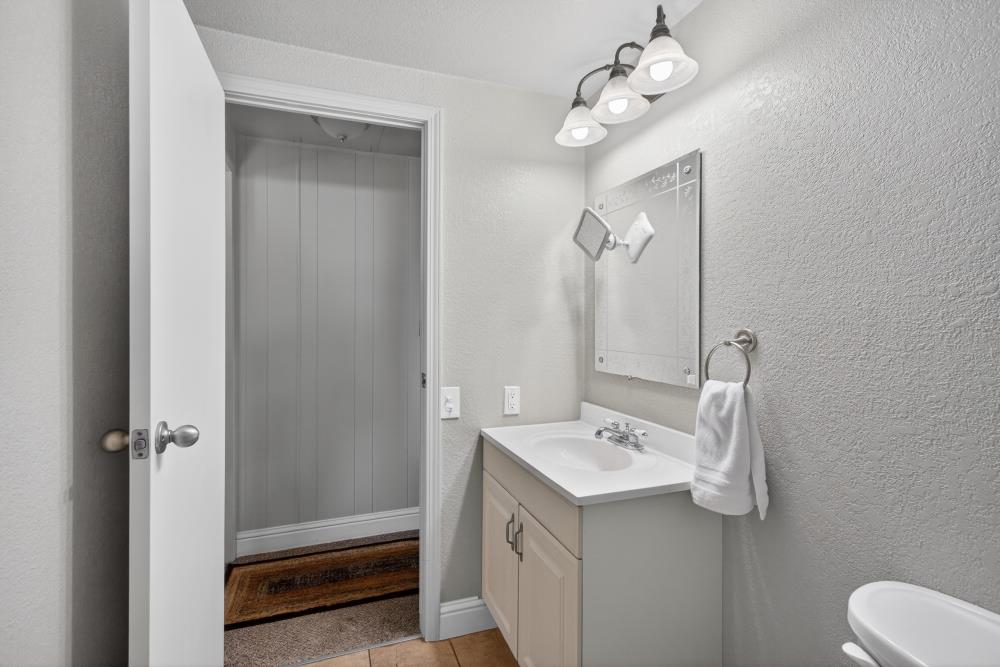 7460 Azimuth Lane, Unit 253 Sacramento, CA 95842 - Photo 29 of 50 a bathroom with a sink a toilet and shower