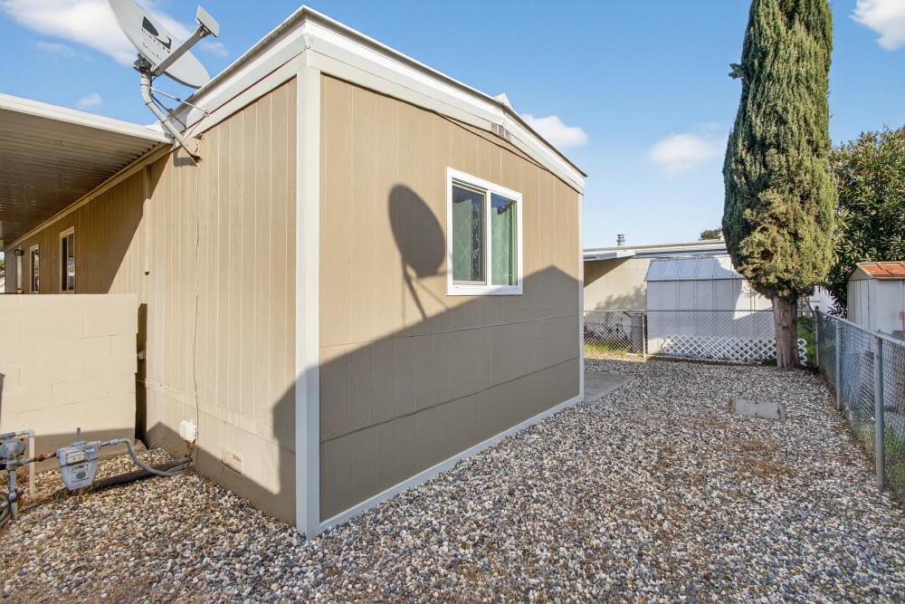 7460 Azimuth Lane, Unit 253 Sacramento, CA 95842 - Photo 34 of 50 a view of a house with a yard