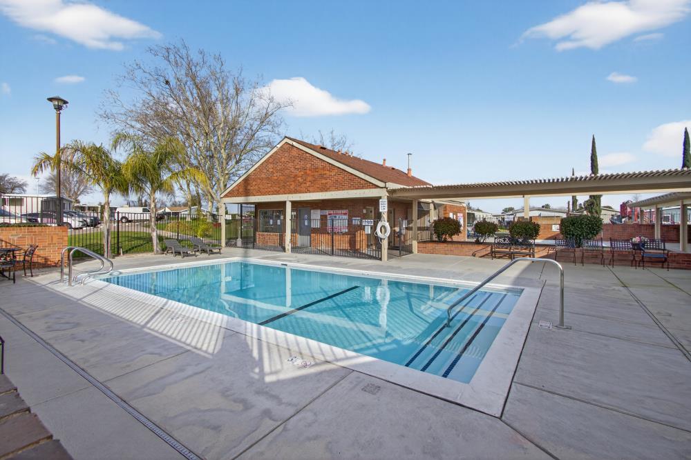 7460 Azimuth Lane, Unit 253 Sacramento, CA 95842 - Photo 37 of 50 an outdoor space with swimming pool and furniture