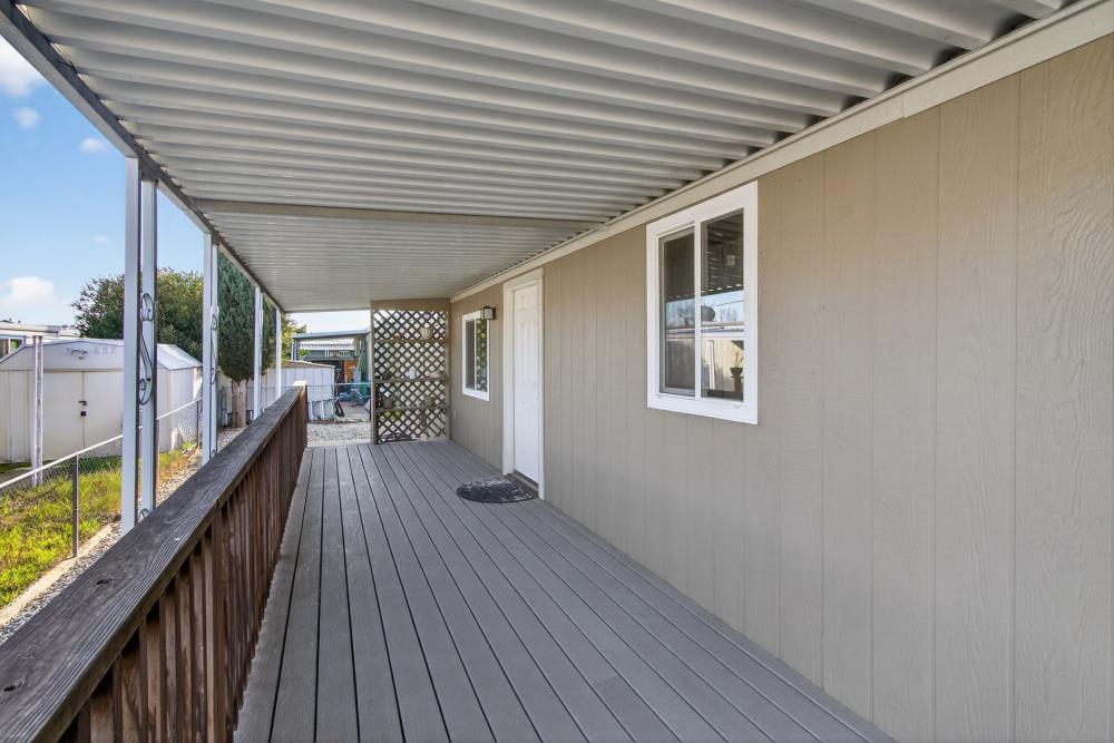 7460 Azimuth Lane, Unit 253 Sacramento, CA 95842 - Photo 5 of 50 a porch with wooden floor