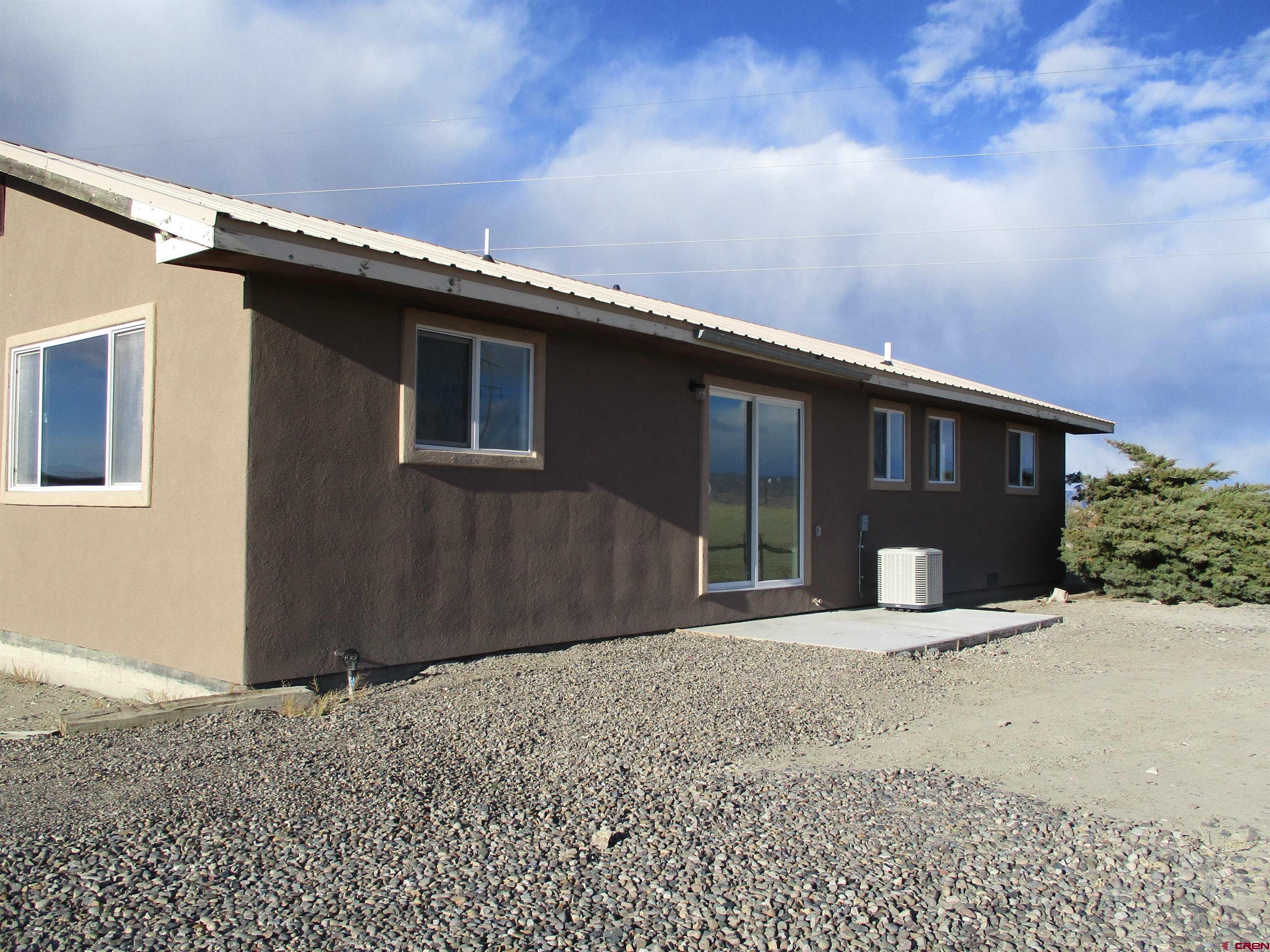 18950 Beaver Road Delta, CO 81416 - Photo 2 of 10 a front view of a house