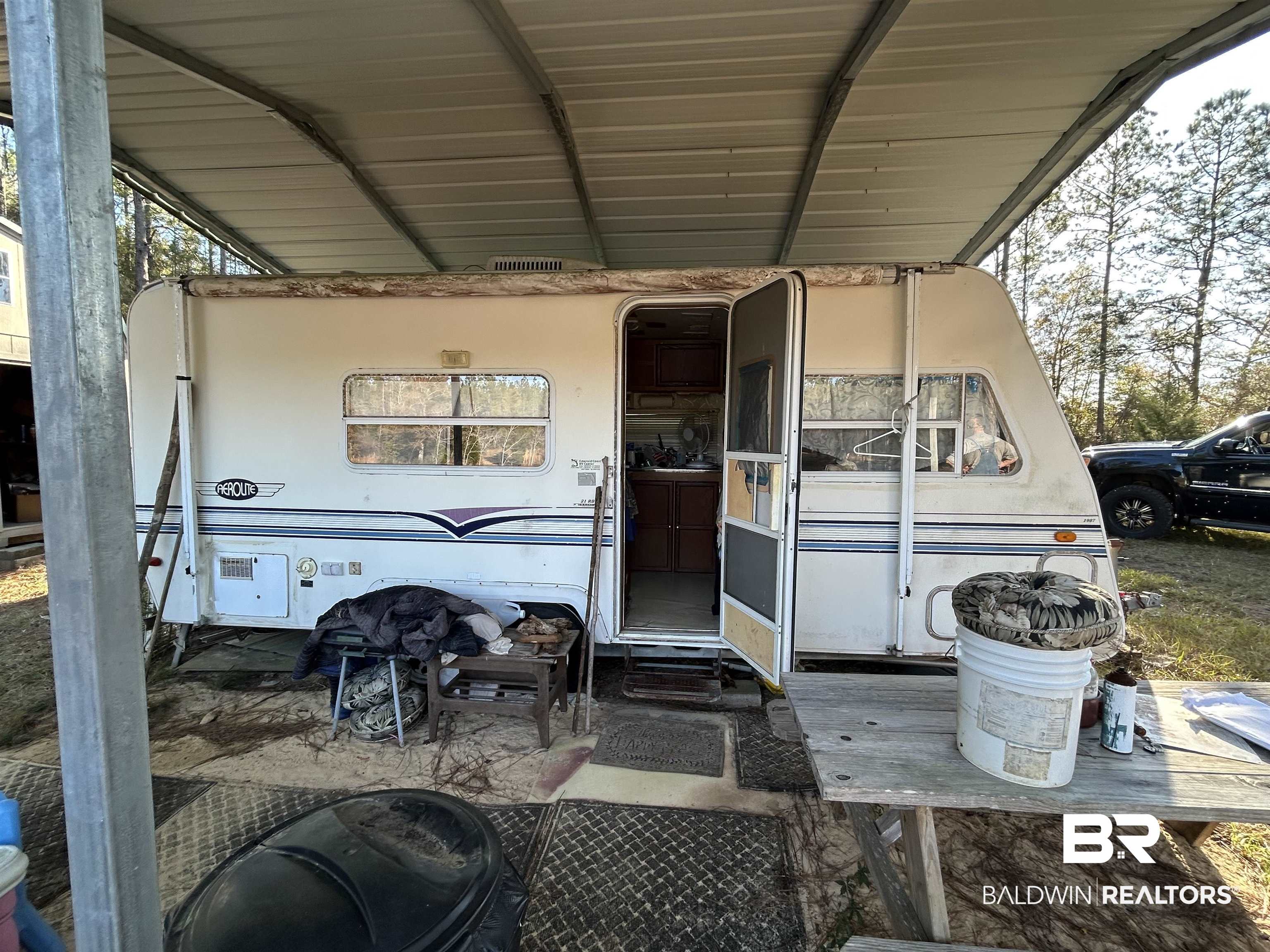 9550 A Sand Ridge Road Citronelle, AL 36522 - Photo 10 of 16 View of patio with a carport