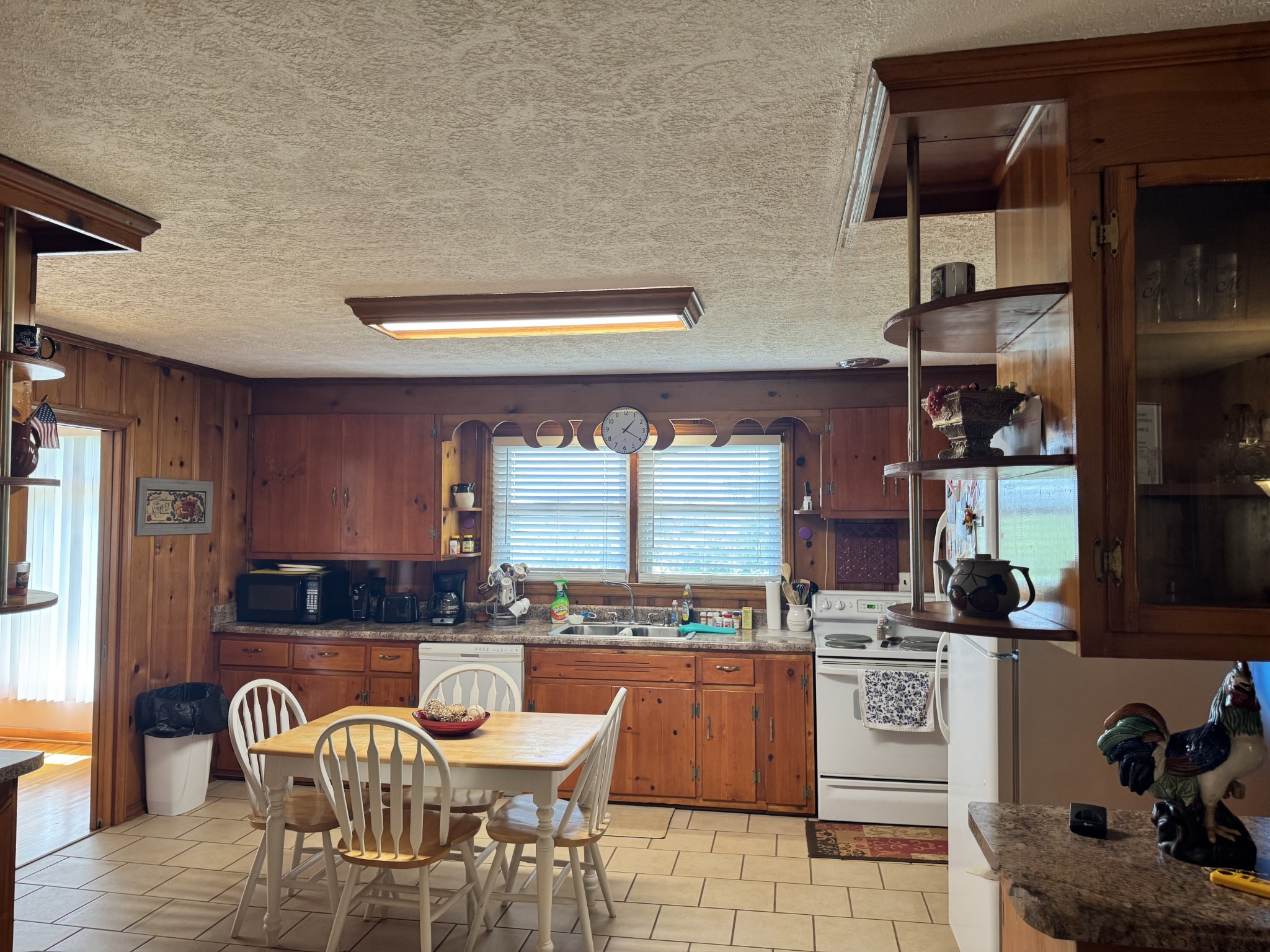 17 Turkey Creek Road Carthage, TN 37030 - Photo 14 of 40 a kitchen with stainless steel appliances granite countertop a stove a sink and a refrigerator