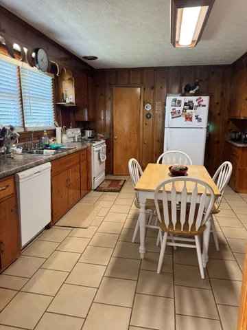 a view of a living room and bathroom