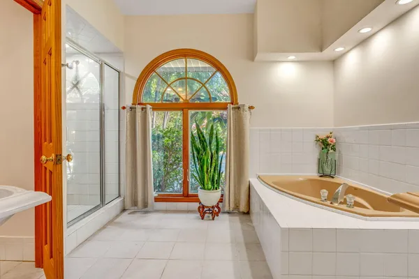 a view of a hallway with furniture and entryway