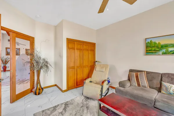 a living room with furniture and a window