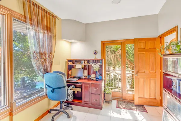 a bathroom with a glass shower door