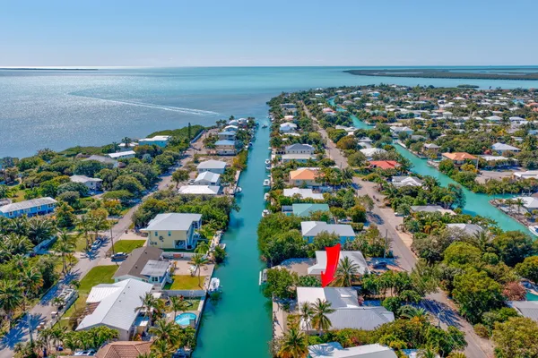 a view of a backyard of the house
