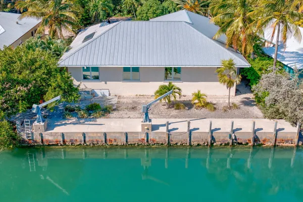 a view of a lake with a house