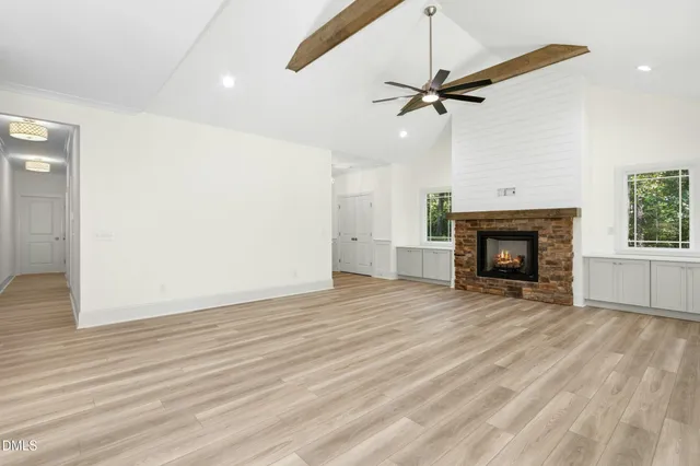 a living room with a fireplace