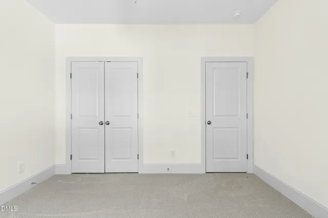 a bathroom with a granite countertop window and a shower