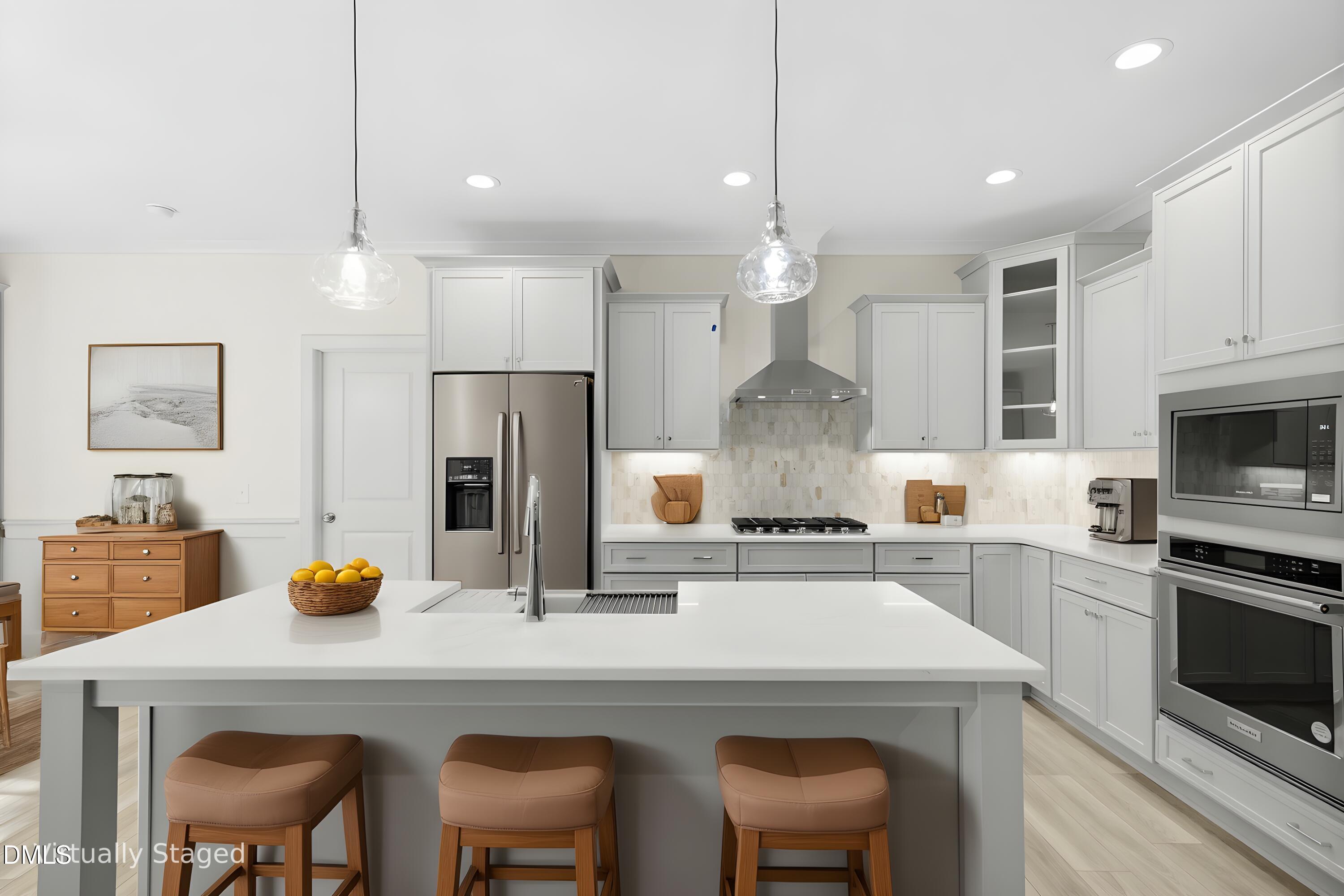 925 Lynch Road Selma, NC 27576 - Photo 7 of 39 a kitchen with cabinets a sink stainless steel appliances and chairs