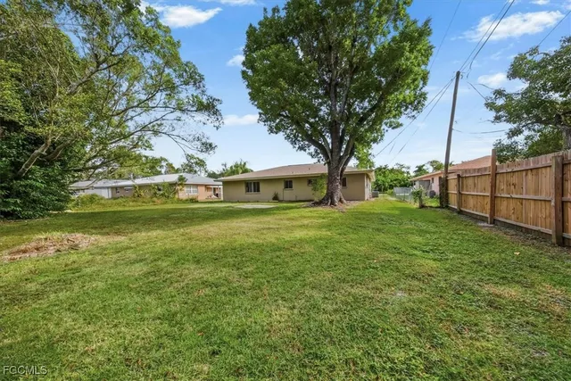 a view of a trees with a big yard