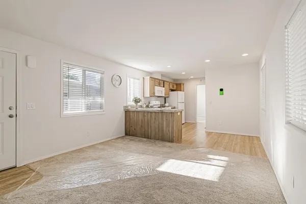 a view of a kitchen with kitchen and a window